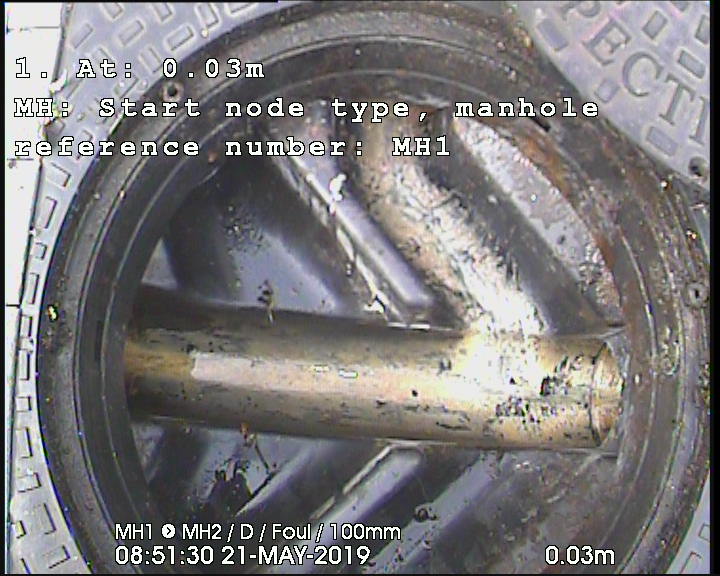 Inspection camera view inside a circular drainage pipe